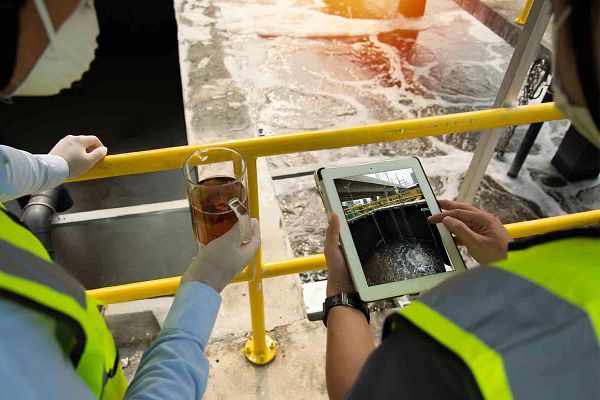 Engineers monitoring wastewater levels